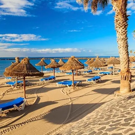 Апартаменты Luminoso Y Bonito Con Piscina En Frente Del Mar Лос Кристианос